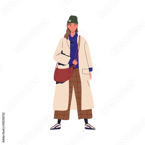 Young stylish woman demonstrating trendy outwear. Female character in fashion...