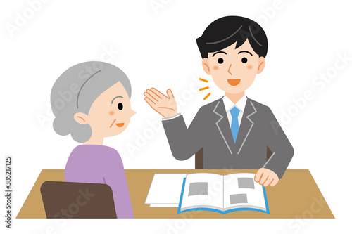 相談に来た高齢女性に説明をするビジネススーツの男性のイラスト/白背景
