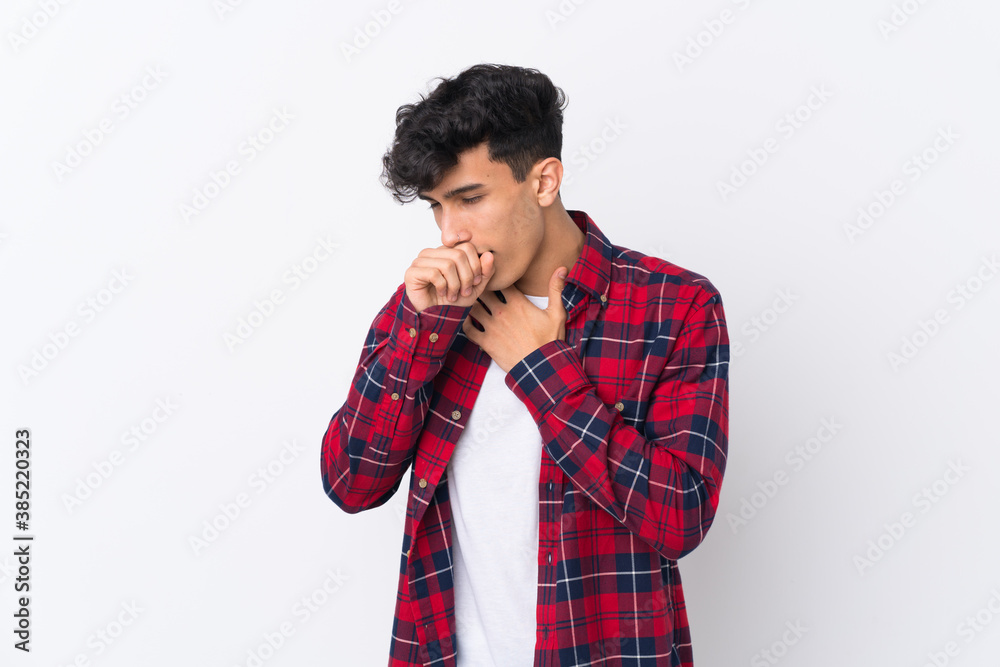 Young Argentinian man over isolated white background is suffering with cough and feeling bad Young Argentinian man over isolated white background is suffering with cough and feeling bad