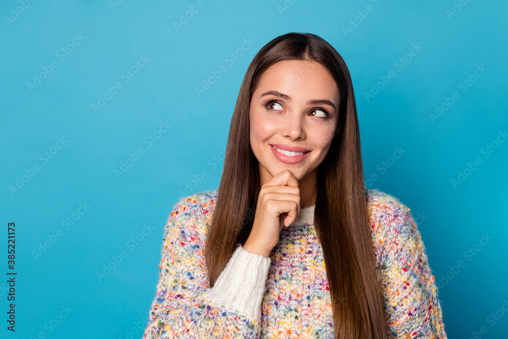 Closeup photo of cute attractive lady good mood smiling white teeth long straight hairdo tender appearance look side empty space arm on chin wear warm sweater isolated blue color background Closeup photo of cute attractive lady good mood smiling white teeth long straight hairdo tender appearance look side empty space arm on chin wear warm sweater isolated blue color background