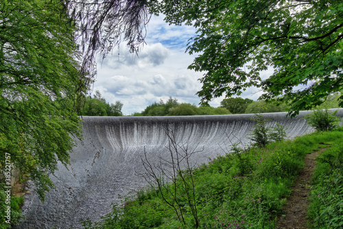 water cascading over a dam in the Forest of Bowland, Lancashire, England photo