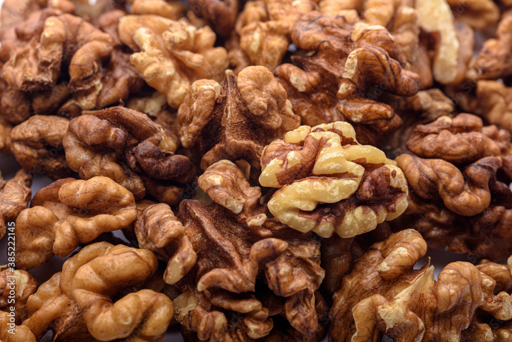 Peeled walnut kernels close-up, focus on foreground Peeled walnut kernels close-up, focus on foreground
