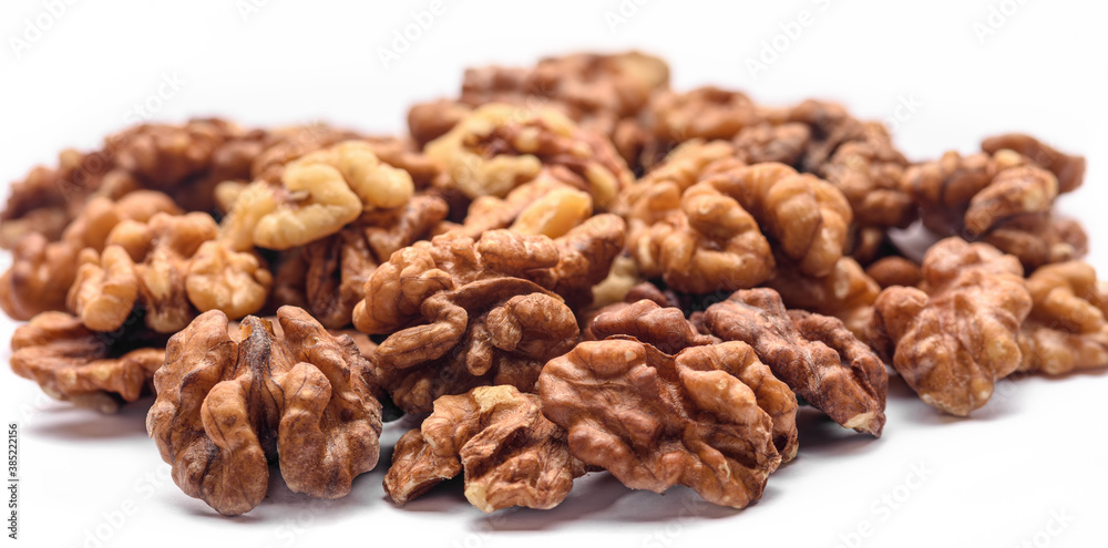 Peeled walnut kernels close-up, focus on foreground