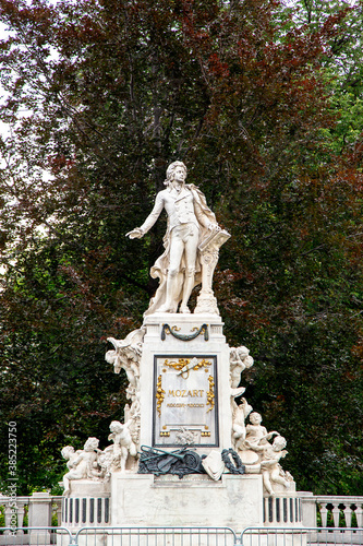 Vienna, Austria. The Mozart Monument (German: Mozart-Denkmal). Architect Karl Konig (1841–1915) and sculptor Viktor Tilgner (1844–1896). Burggarten park photo