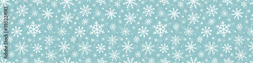 Christmas background with snowflakes. Design of winter seamless pattern. Vector