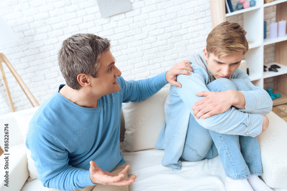 Fototapeta premium The son does not want to talk with dad.