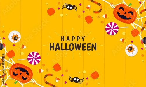 Happy Halloween Background vector illustration. Top view of Halloween candies on orange table background.