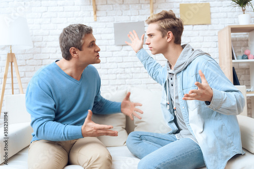  Son screams at dad while they sit at home.