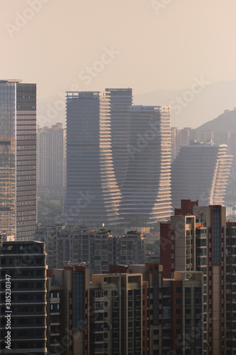 Overview of city buildings in sunset
