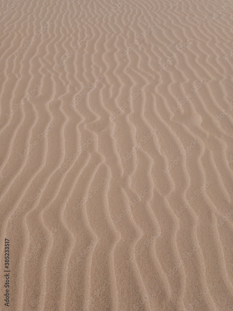 Texture of sand with beautiful dunes Texture of sand with beautiful dunes