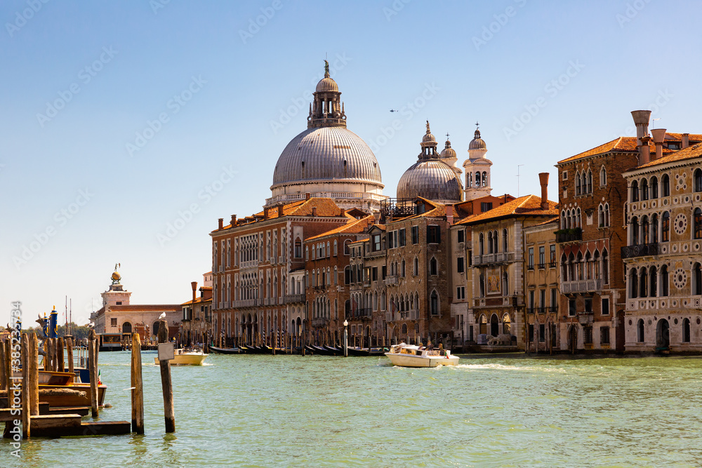 Fototapeta Picturesque view of Venice Grand Canal with gondolas and old buildings on banks of canal