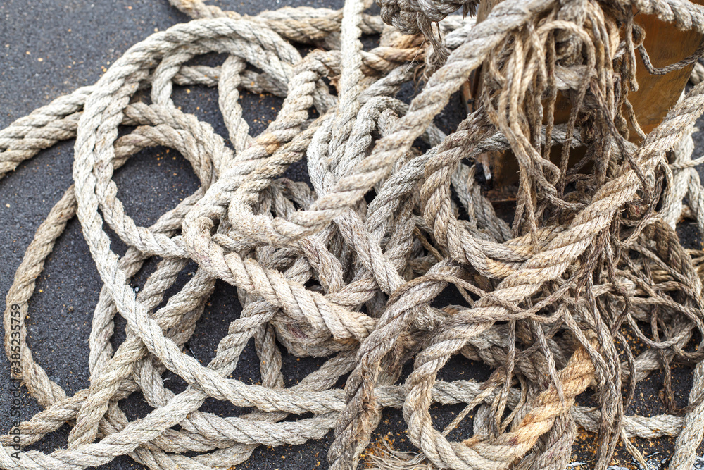 A rope wrapped around a pole. The texture of the rope