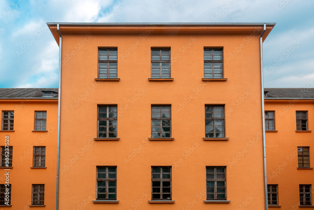 Facade of orange industrial building