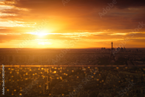 Photography Epic sunset above Paris, the headquarter of La Défense and the iconic Eiffel Tow