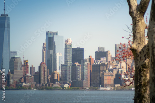 Shot of the skyline of New York City from the Hudson river  with skyscrapers of the downtown district and Wall Street