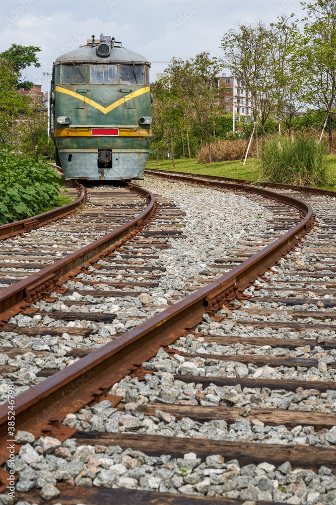 Obraz premium Railroad tracks and locomotives in the wild