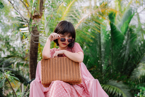 Fashion portrait - woman picnic in the forest in the jungle.