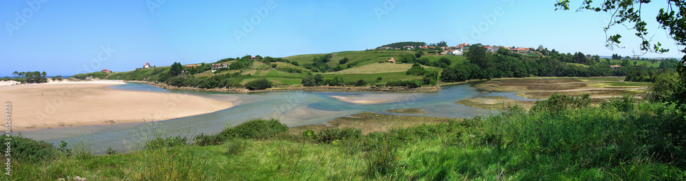 View on Playa de Oyambre y la Rabia, located on the bay of Biscay, Cantabria, Spain.