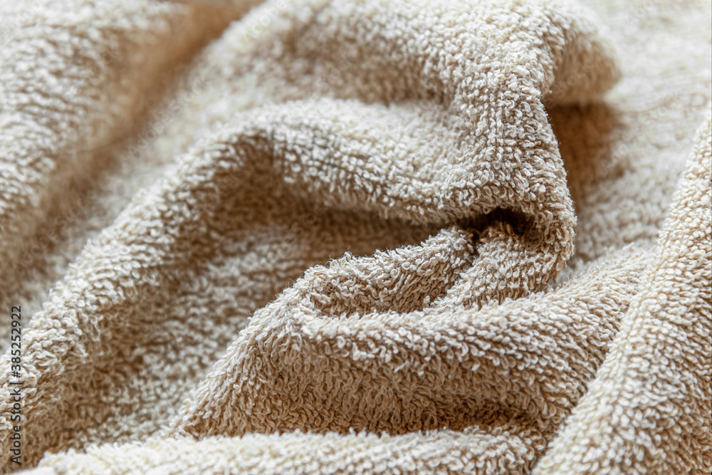 abstract background of beige terry towel close up abstract background of beige terry towel close up