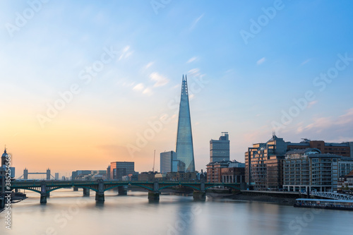 London skyline view from Thames river united kingdom at the sunrise 