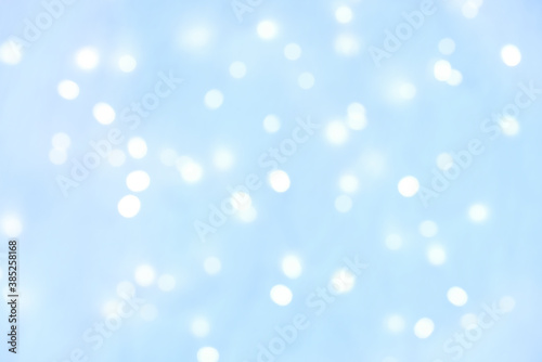 abstract background. light blue blurry lights. bokeh. texture. concept for christmas, new year, holiday