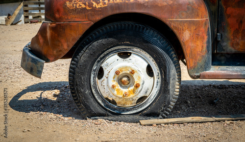 truck wheel of an abandoned truck in the desert