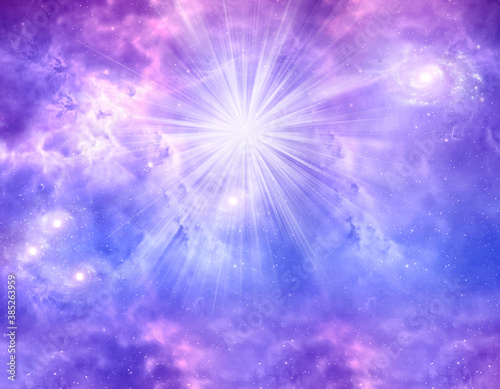 abstrac angelic religious spiritual magic background with sky and clouds, rays of light and purple, pink, blue tonality photo