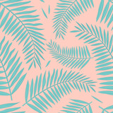 Vector seamless pattern with tropical leaves of palm in bright colors on pink background. For wallpapers, decoration, invitation, fabric, textile and print, web page backdrop, gift and wrapping paper.