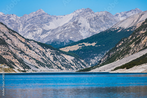 Valley and lake in Livigno Italy in autumn. 