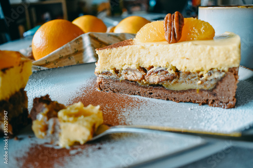 Piece of vegan cake with orange 