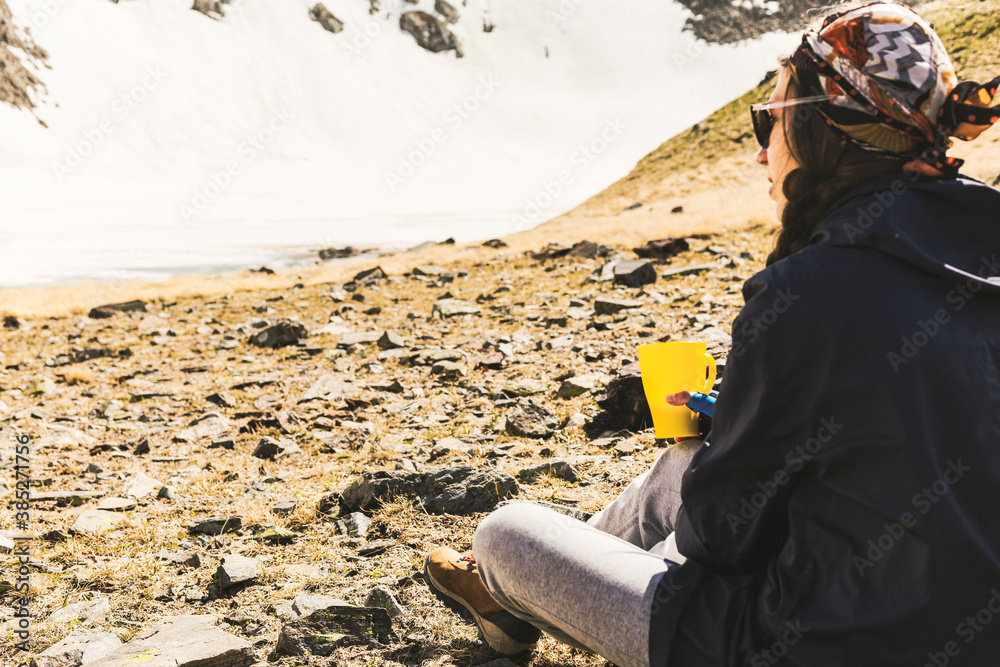Girl is drinking tea enjoying the beautiful view. Girl is drinking tea enjoying the beautiful view.