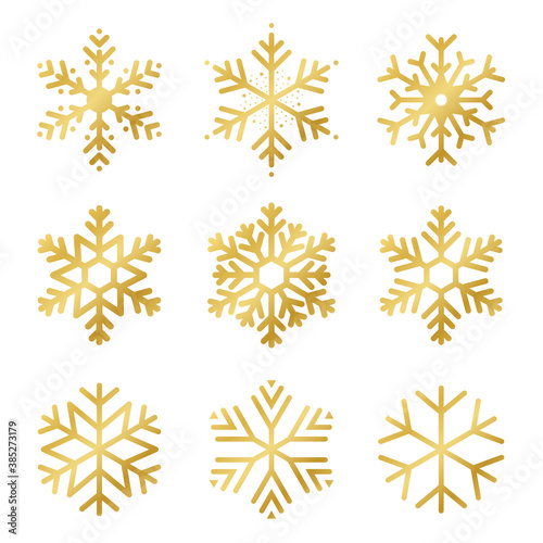 Set of golden snowflakes for Christmas decoration. Shiny gold snowflakes, various abstract and geometric patterns. Beautiful snowflakes isolated on white background