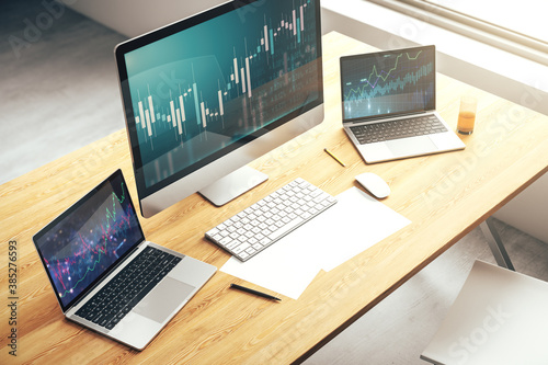 Abstract creative financial graph on modern laptop screen, forex and investment concept. 3D Rendering