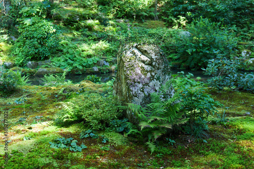 Photography A stone monument in a Japanese garden