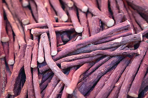 Liquorice. Fresh licorice root (Selective focus)