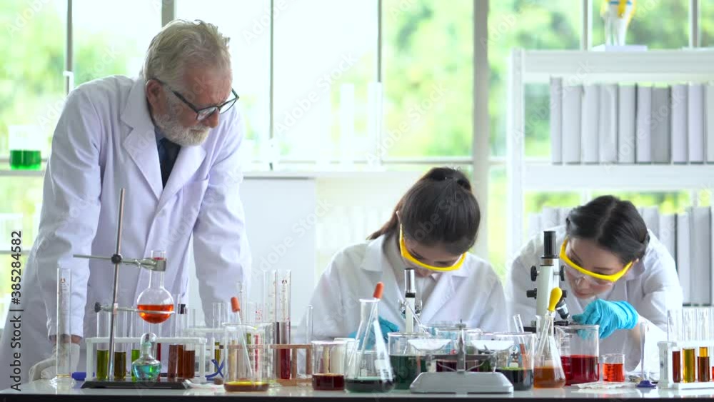 Scientist team working in the laboratory.
Scientist team working in the laboratory.
