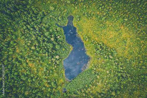Fototapeta Naklejka Na Ścianę i Meble -  Aerial view of a Finland shaped artificial lake in Finnish Lapland during summer