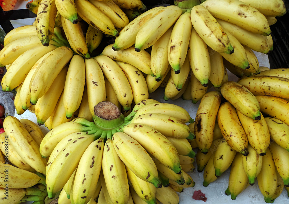 fresh ripe bananas on the stall for sale