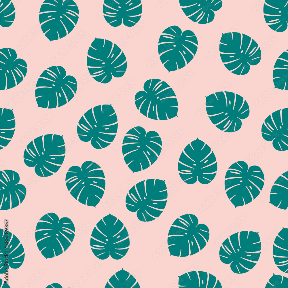 Monstera leaf pattern on a pink background