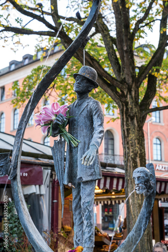 Karl Valentin Brunnen fountain at Viktualienmarkt market place, Munich, Germany