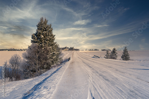 Road through the rural winter landscape of Prince Edward Island, Canada. © V. J. Matthew