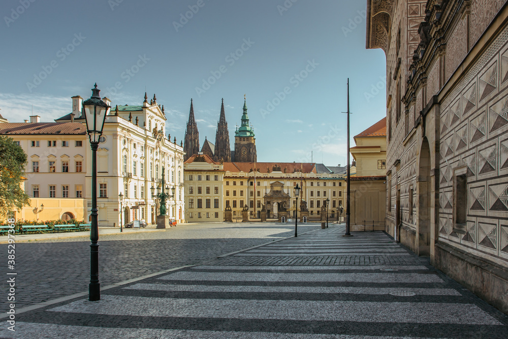 Fototapeta premium Empty street with colorful houses in Prague,Czech capital. No tourists,no sightseeing during COVID 19 quarantine,September 2020.Historical centre without people.Amazing European cityscape.