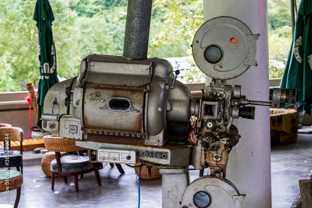 A close-up of the appearance of a retro vintage film movie projector A close-up of the appearance of a retro vintage film movie projector