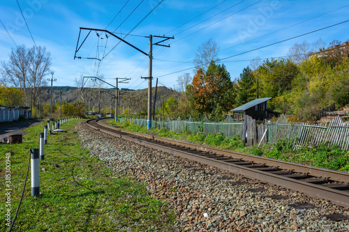 Railway track on the outskirts of the village of Mundybash in Gornaya Shoria photo