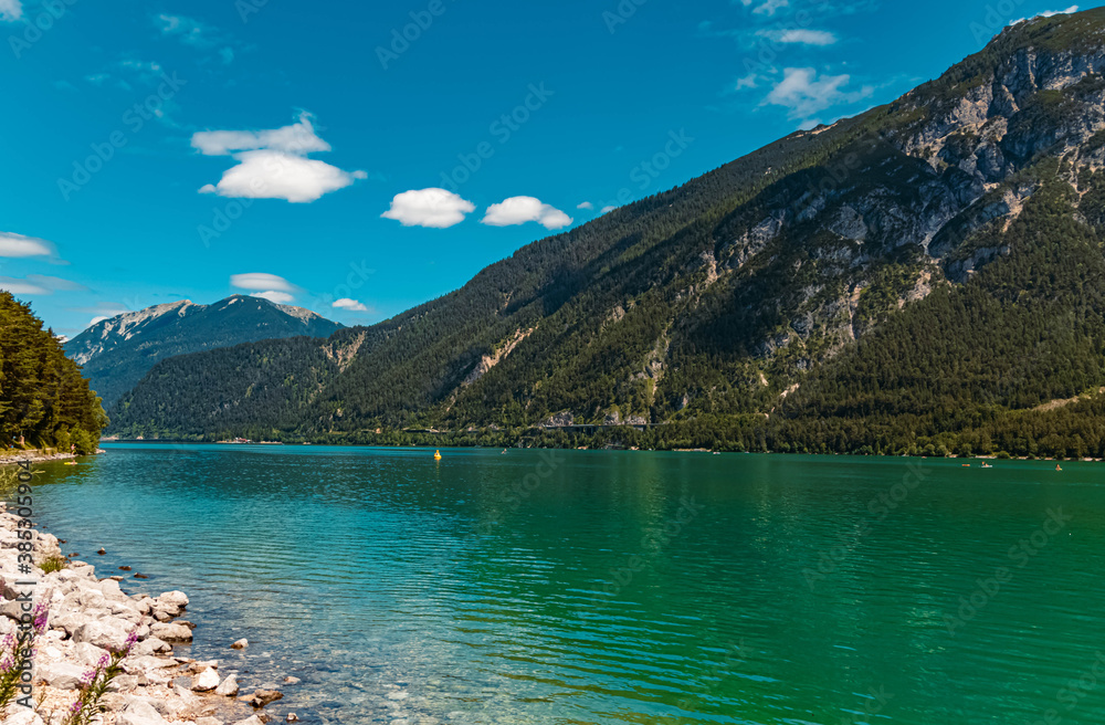 Obraz premium Beautiful alpine view with reflections at the famous Achensee, Pertisau, Tyrol, Austria