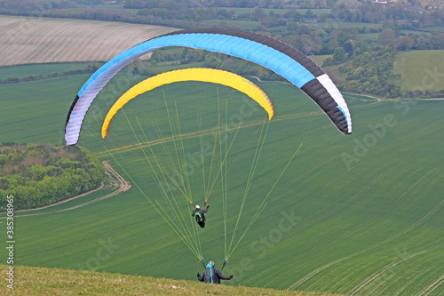 Paragliders launching at Combe Gibbet, England