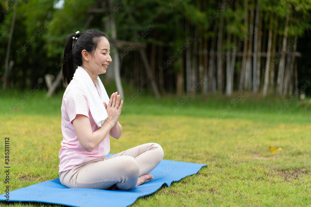 Young woman doing yoga in morning backyard at home. Outdoor workout healthy lifestyle concept. Young woman doing yoga in morning backyard at home. Outdoor workout healthy lifestyle concept.