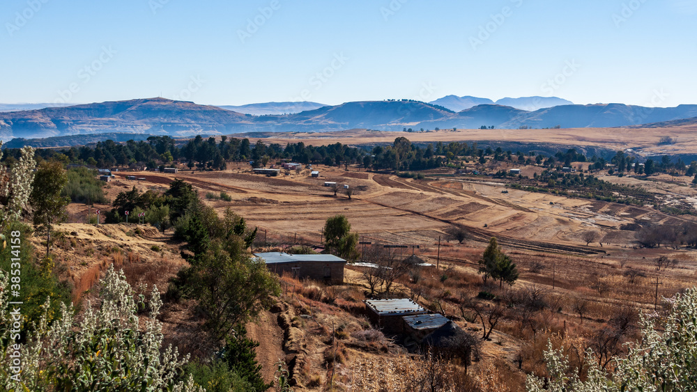 Lesotho is a small country in Africa. It has many mountains which on winter mornings are covered by mist while the land is still very dry.