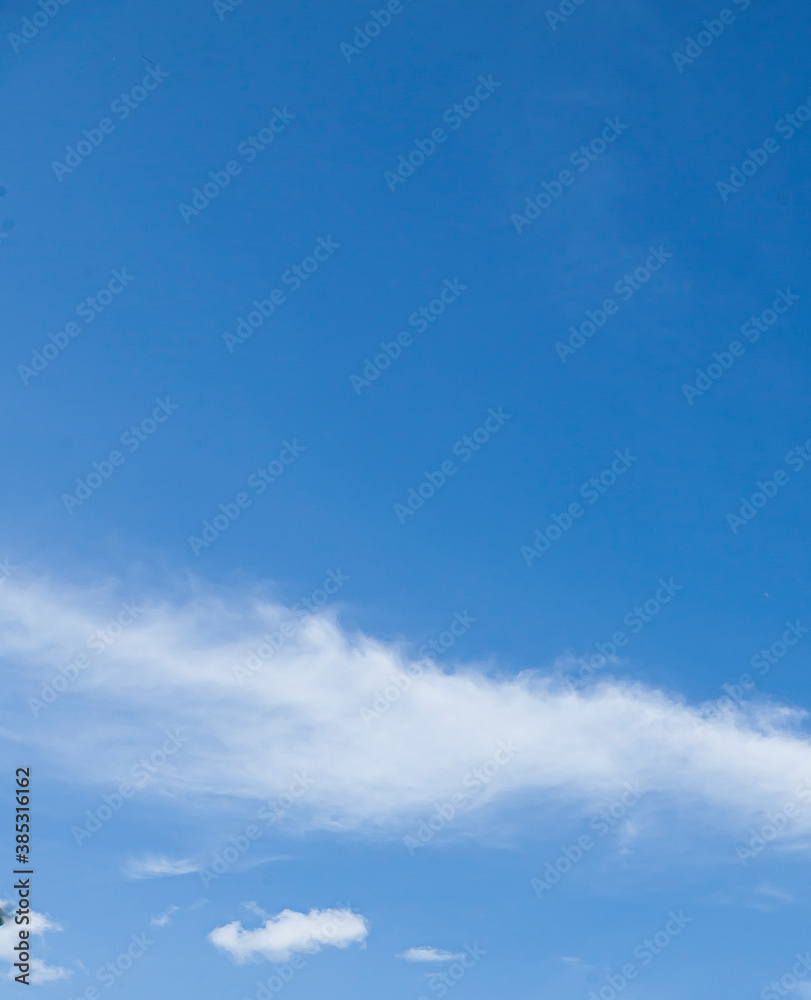 Fototapeta premium Image of a partly cloudy and partly clear sky during the day