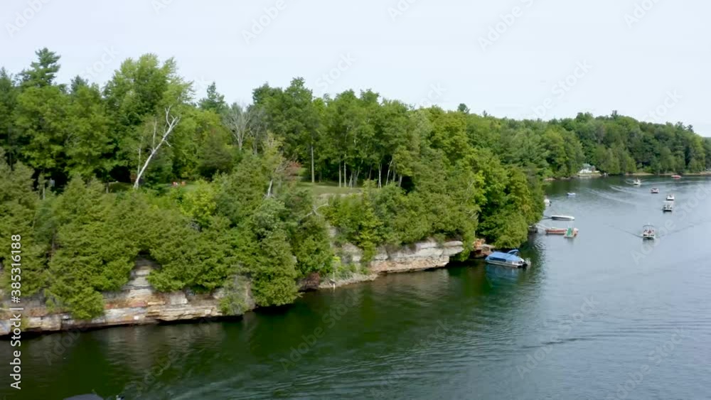 Aerial Drone Flight Above a Boat Parade on a Lake in the USA during the Summer Aerial Drone Flight Above a Boat Parade on a Lake in the USA during the Summer